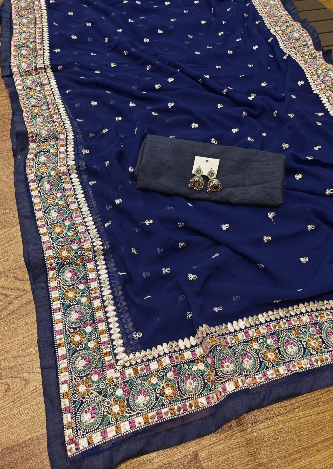 The Modern Charm Of Vintage Georgette Party Wear Sarees Catalog